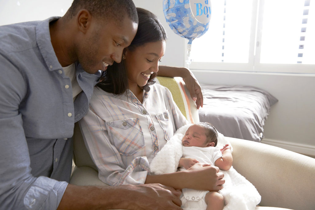 Family with newborn infant