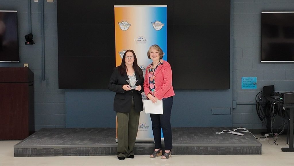 Sonia Roldan-Jackson receiving a 2026 Kindness Award